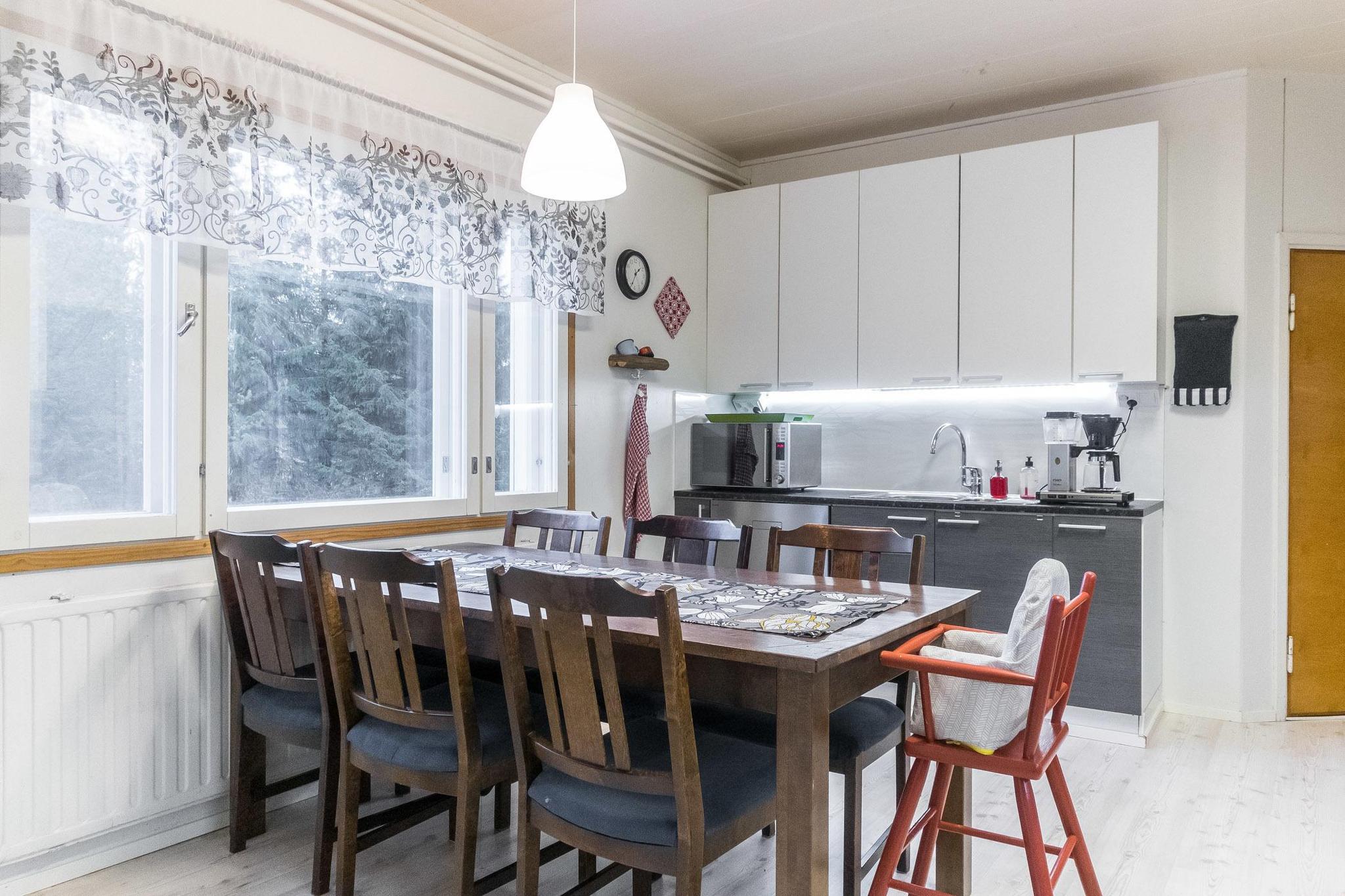 Cozy living area inside the Backcountry Base, featuring modern amenities.