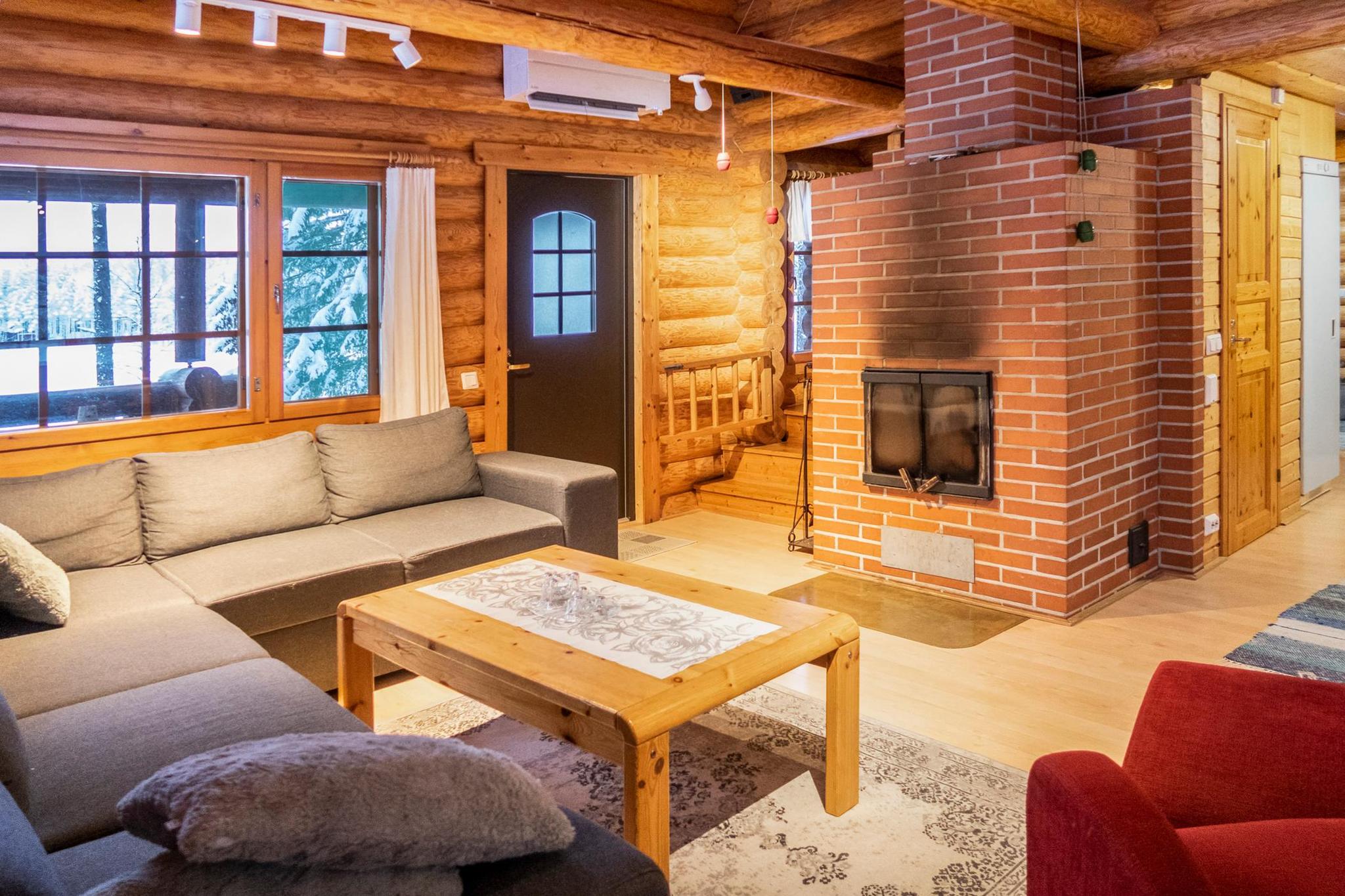 Spacious kitchen-living room area inside Karapalo cabin.