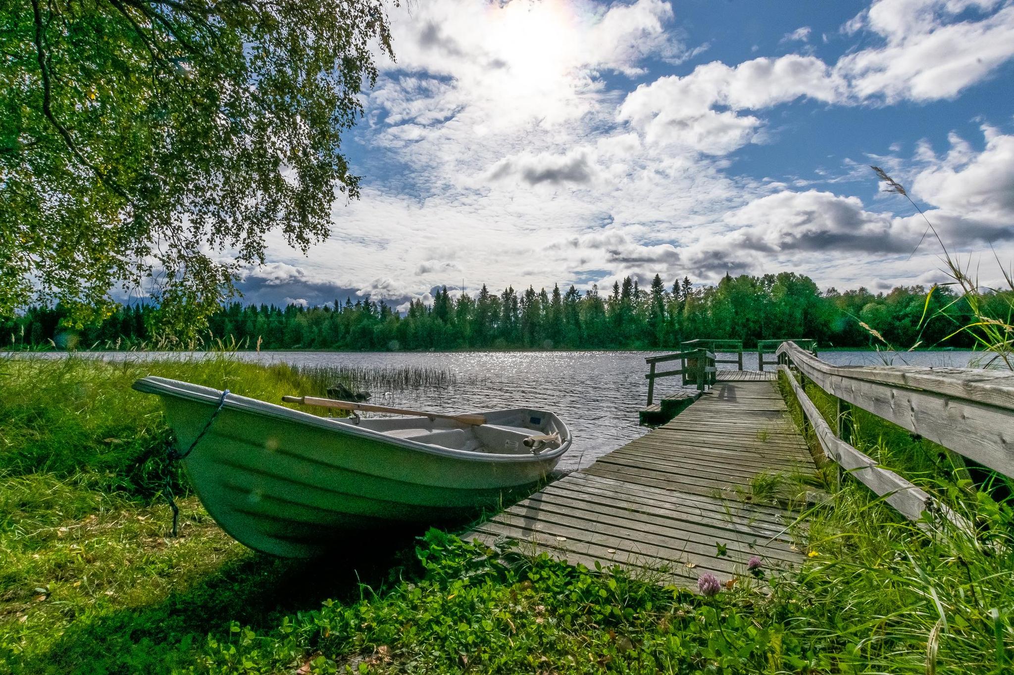 Lehtola's riverside sauna with traditional wood architecture.