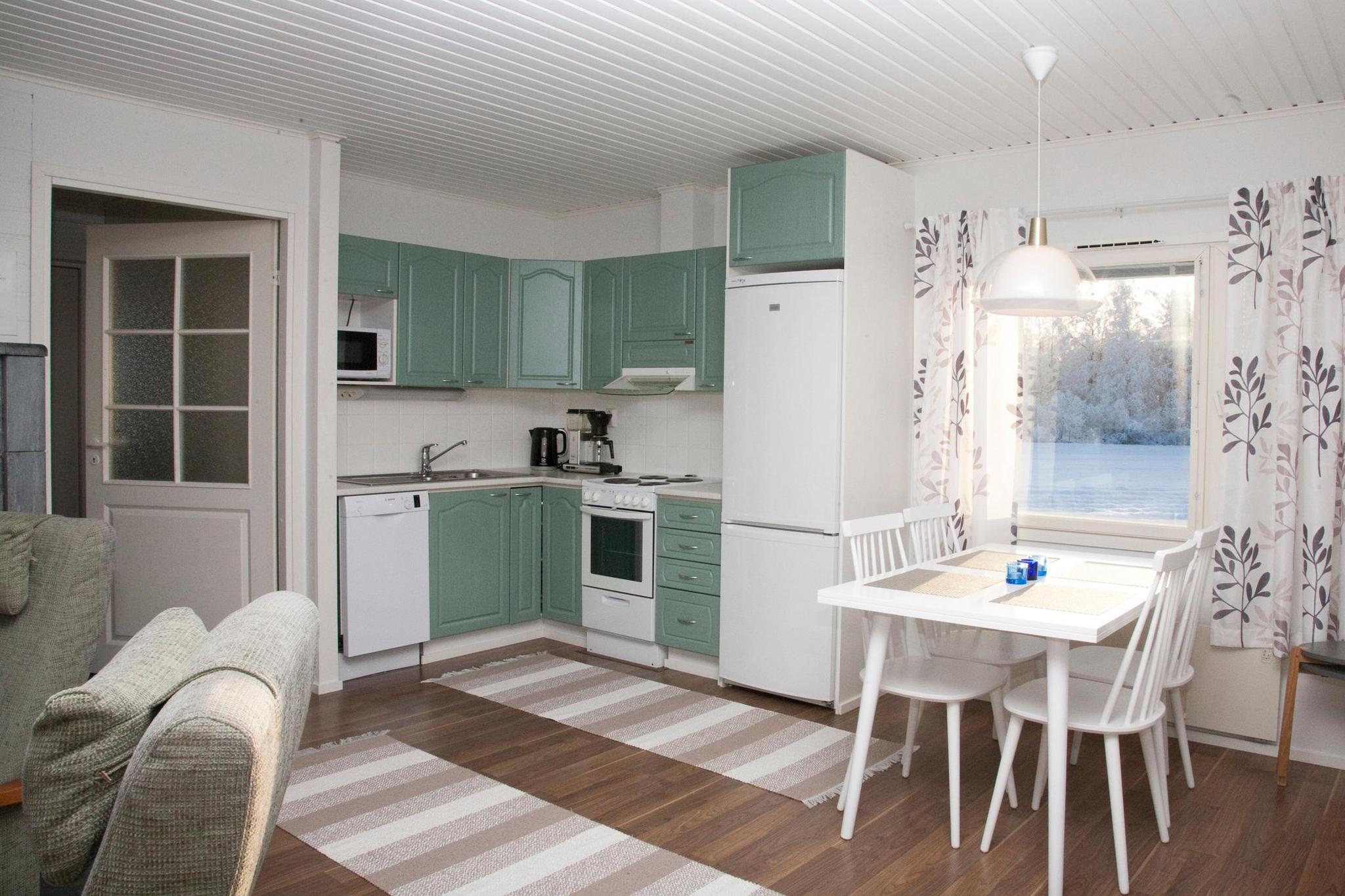 Cozy wooden cottage in Sotkamo surrounded by nature.