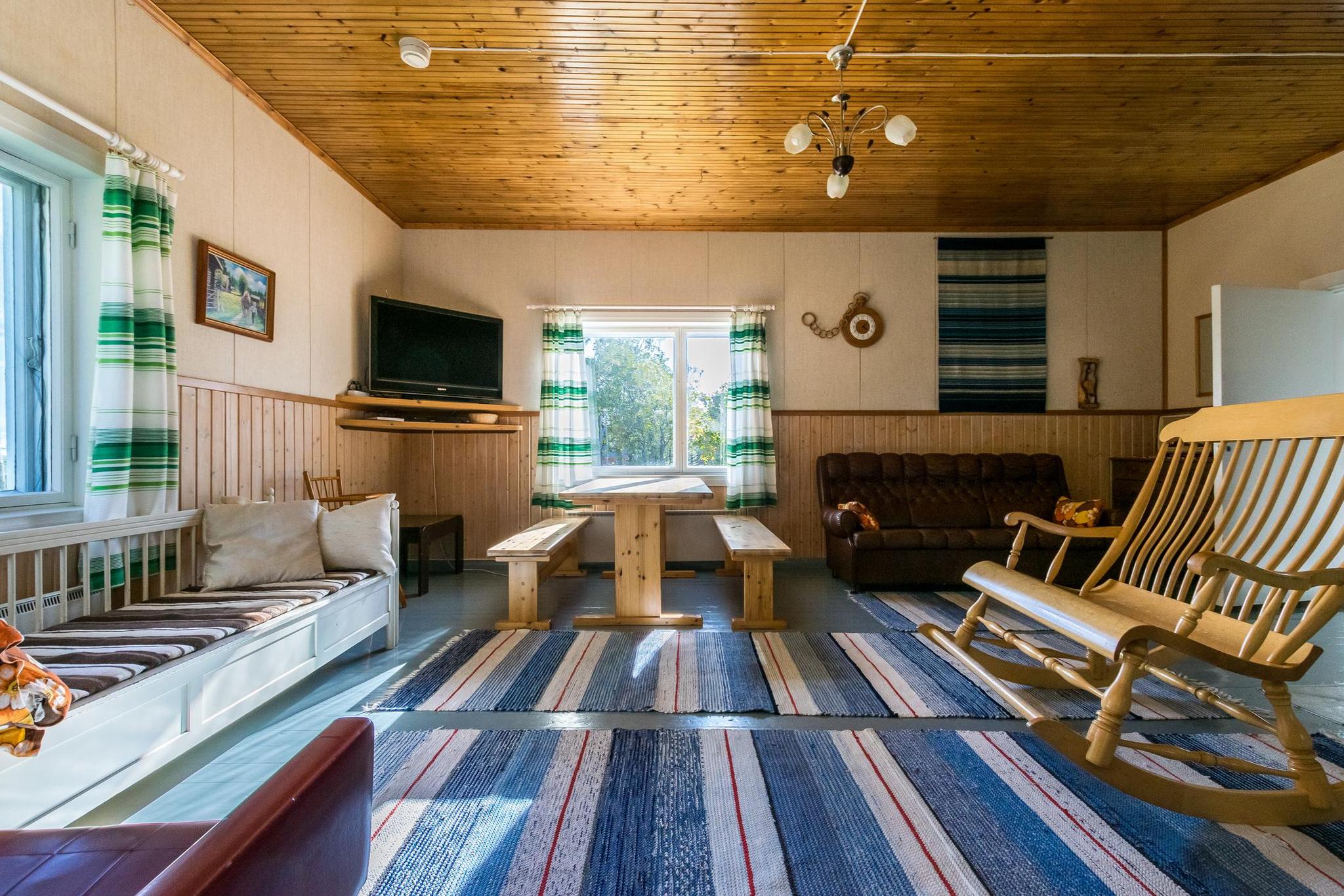 Exterior of the traditional Tervamäki house with its rustic charm.