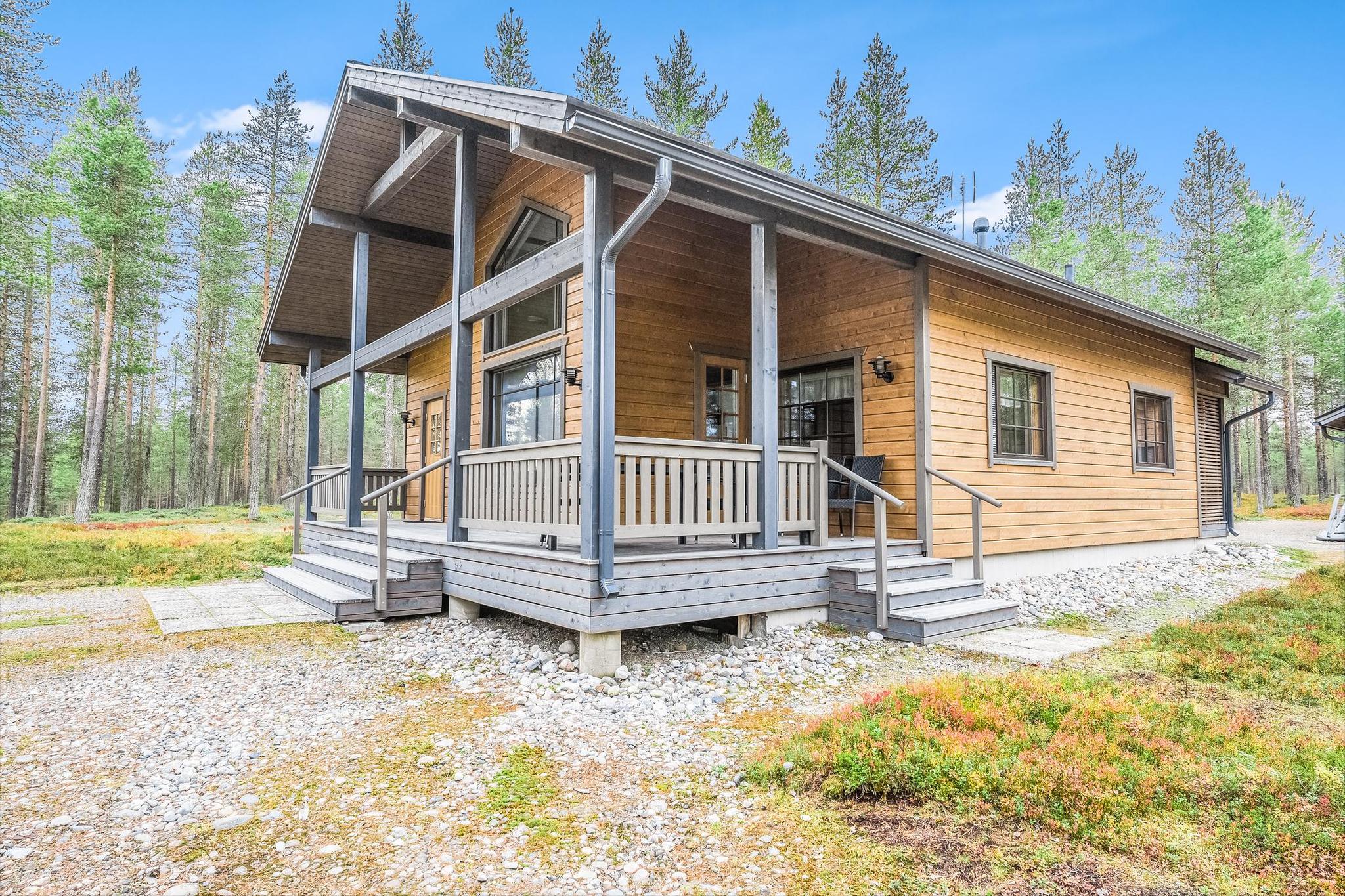 An apartment located in Huuhkaja 1, Vuosseli (Eastern Ruka), Northern Ostrobothnia, 25km north of Kuusamo and 800m from Eastern Ruka. This accommodation, part of a log-built semi-detached house constructed in 2000, features a bedroom with a double bed, a second bedroom in the loft with two beds, and an additional loft area with a convertible sofa for two plus two more beds. It also includes a combined kitchen and living room, with a total area of 52 m² plus a 26 m² loft, and the loft's highest point reaching 190 cm.