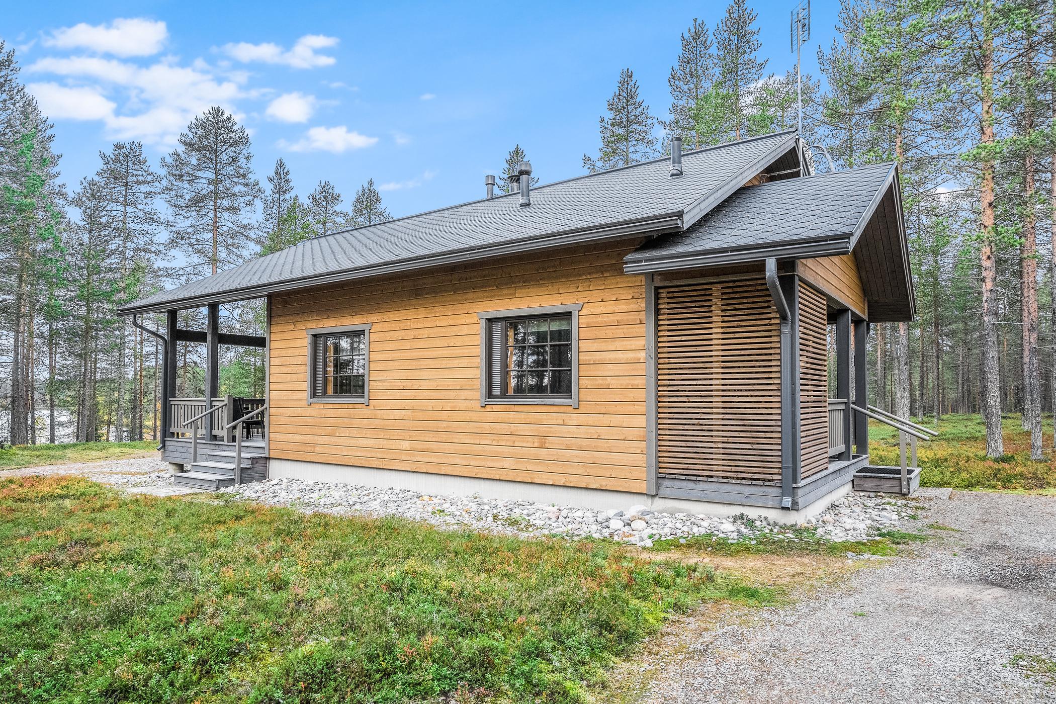 An apartment located in Huuhkaja 1, Vuosseli (Eastern Ruka), Northern Ostrobothnia, 25km north of Kuusamo and 800m from Eastern Ruka. This accommodation, part of a log-built semi-detached house constructed in 2000, features a bedroom with a double bed, a second bedroom in the loft with two beds, and an additional loft area with a convertible sofa for two plus two more beds. It also includes a combined kitchen and living room, with a total area of 52 m² plus a 26 m² loft, and the loft's highest point reaching 190 cm.