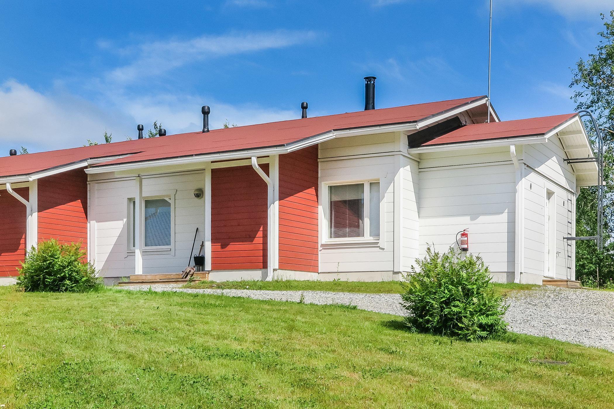 End-of-terrace house located 65 km southwest of Kuusamo near Taivalkoski municipality center, built from thermal log in 2017. The house features a living room/kitchen with a sofa bed, two bedrooms each equipped with two beds and blackout curtains. Includes a washroom, WC, and a sauna with an ever-ready heater that requires at least 4 hours to heat up. Exterior amenities include an open terrace, storeroom, and a car shelter, set in a calm residential area about 150 meters from the river Iijoki.