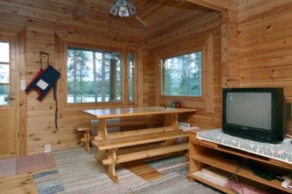 Cozy living area inside Eteläranta with lake views and modern amenities.